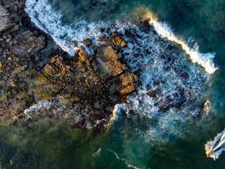 Water Breaking over Rocks